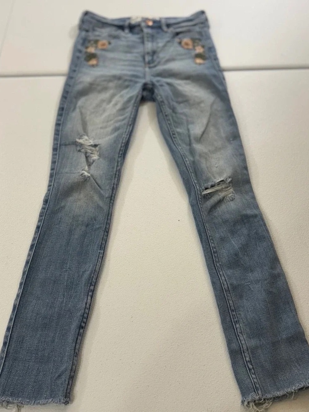 Women's Light Blue Distressed Slim Jeans